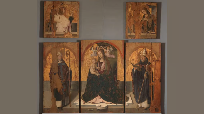 Five-panel religious artwork: central Madonna and Child flanked by saints on gold-toned panels, arranged in a triptych style on a wall.