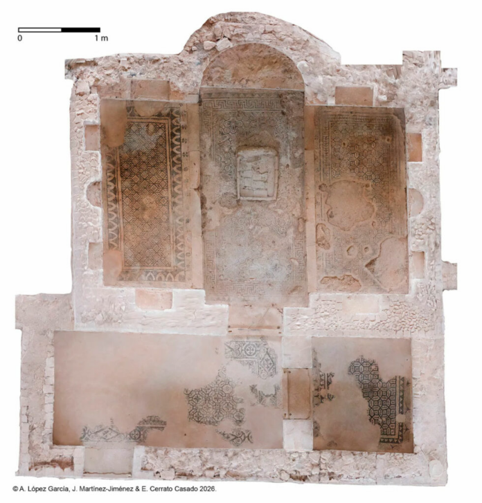 Top-down view of an archaeological ruin with three mosaic floor panels and a central alcove; crumbling walls and rubble, scale bar to 1 m.
